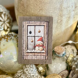 Frosty In Window Frame